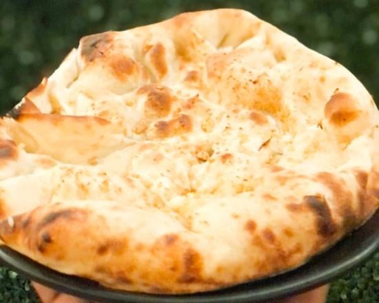 Clay Oven Baked Naan.