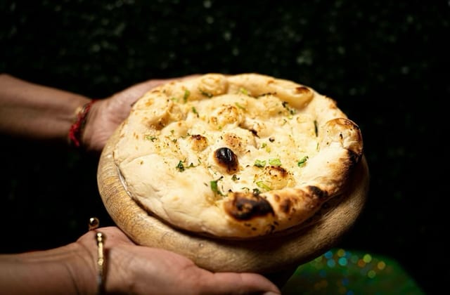 Clay Oven Baked Naan.